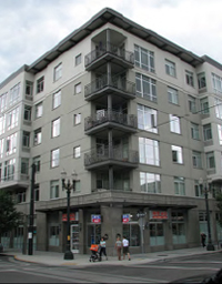 Mixed-use multifamily building.  Developments on the streetcar line in the Pearl District of Portland, Oregon,: give residents easy access to universities, a major hospital, and the central business and shopping districts. Photograph source: Kyle Gradinger via Flickr.com.